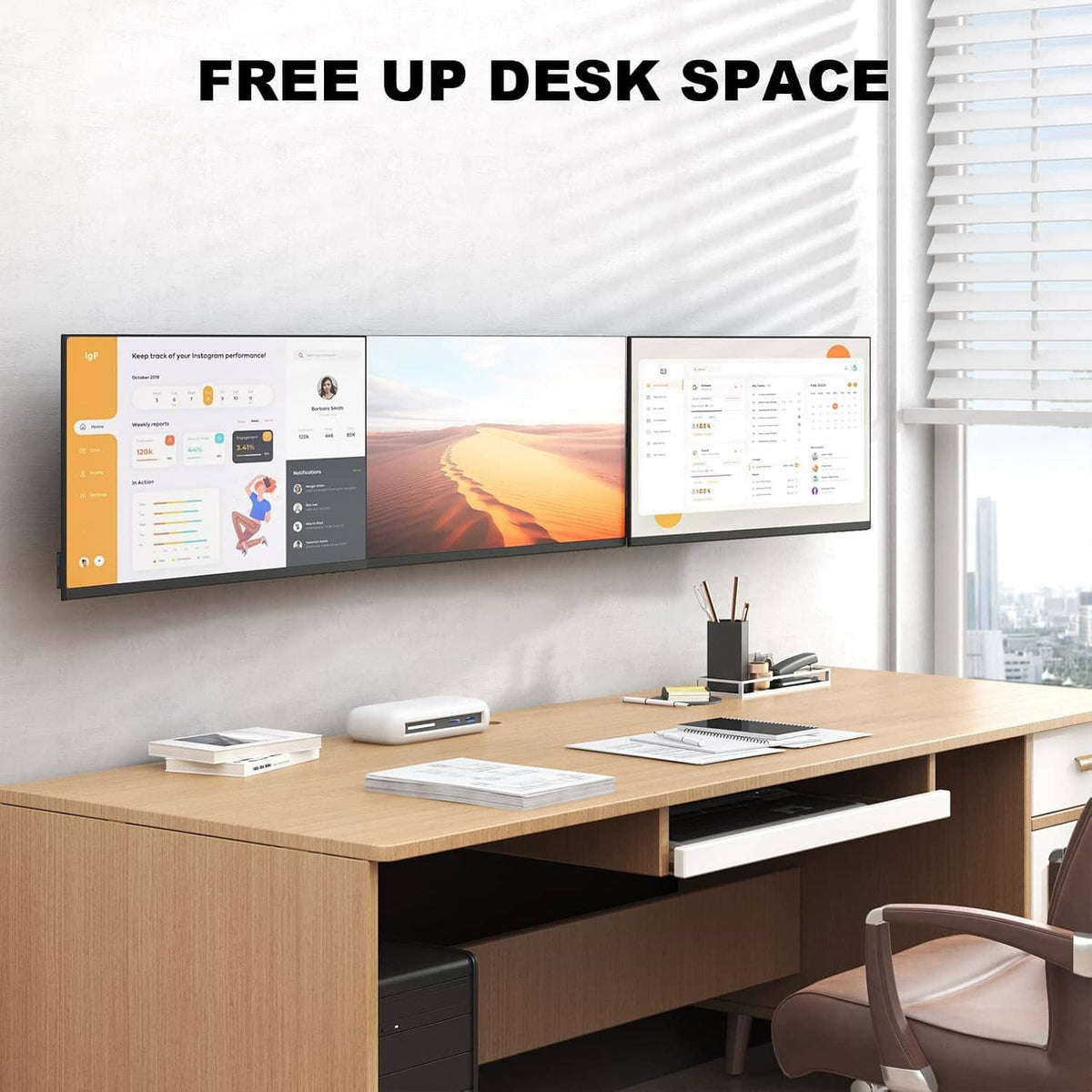 Triple monitor wall mount on wall under blinds, holding three monitors above a desk
