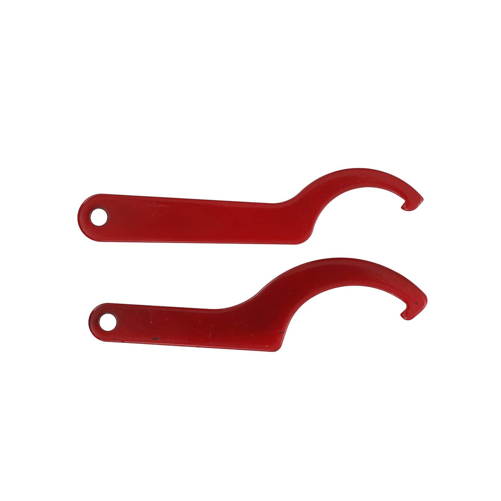 Two red C-shaped coil spring adjustment tools with round mounting holes