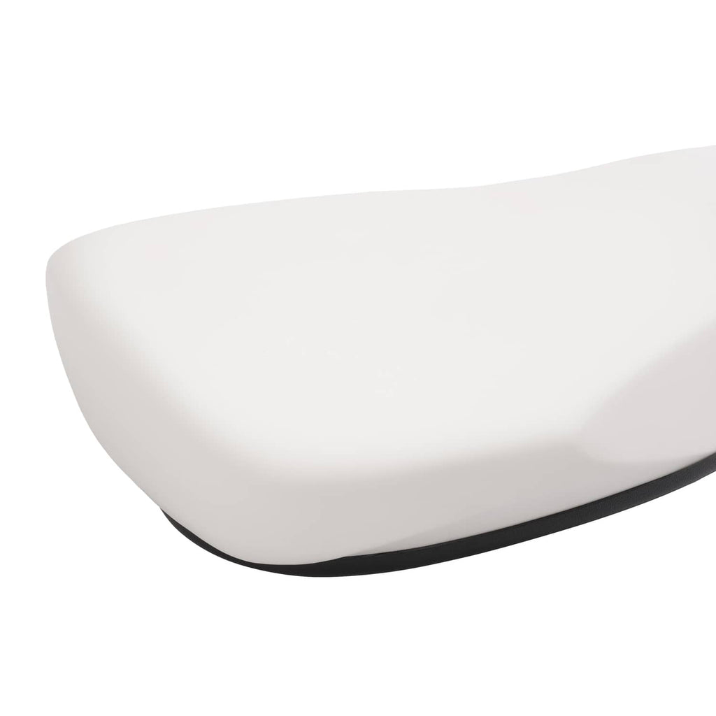 Close-up of white curved seat backrest cushion corner