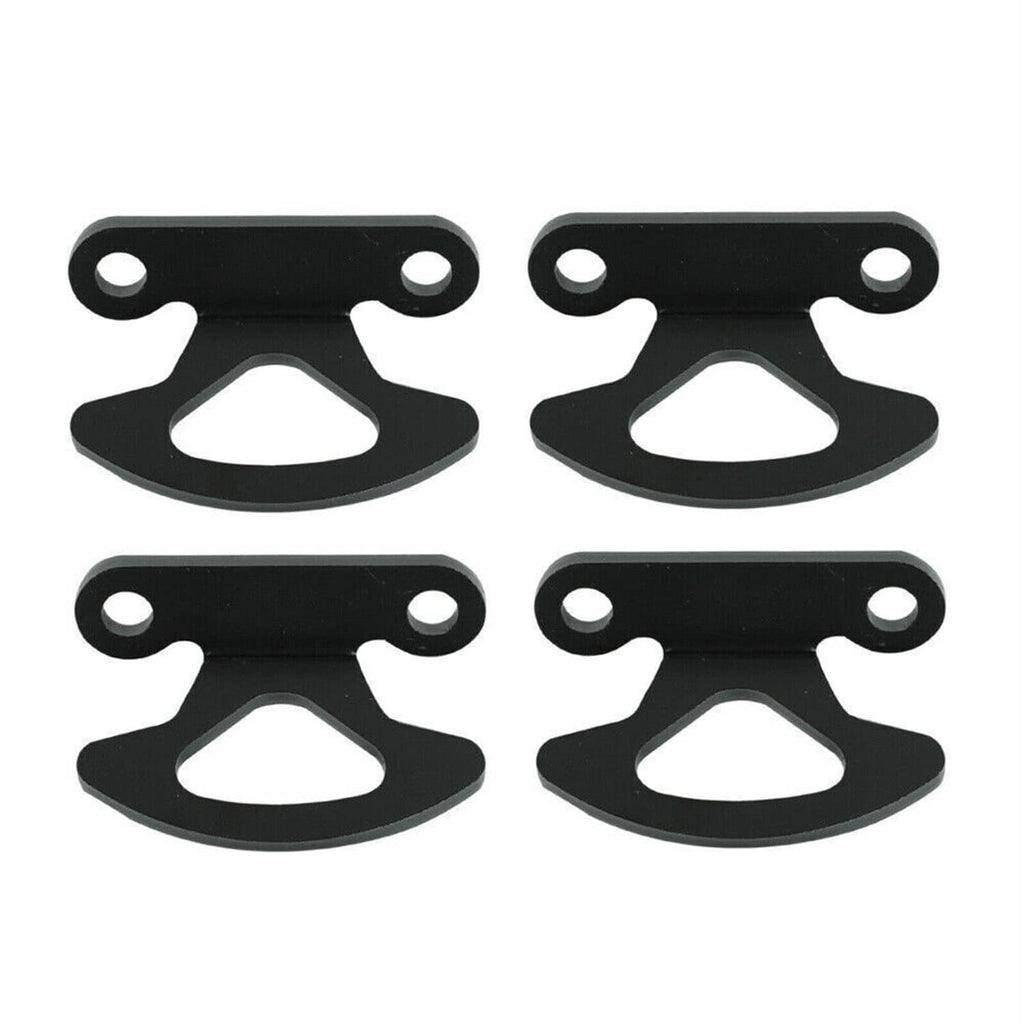 Four black tie-down hook anchor brackets laid out with mounting eye holes