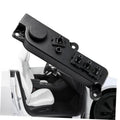 Black front right power seat control switch with round knob and multi-button panel