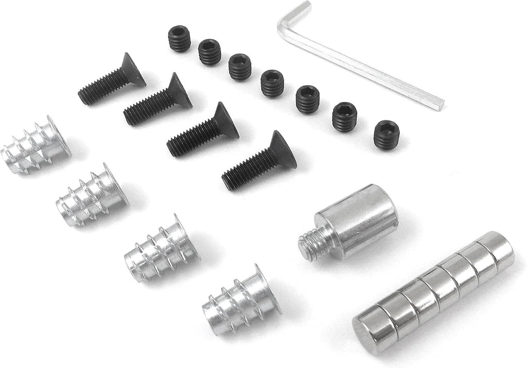 Router table insert mounting hardware assortment: screws, threaded inserts, and steel spacers.