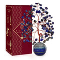 Crystal Tree of Life ornament with lapis lazuli chips and round blue stone base