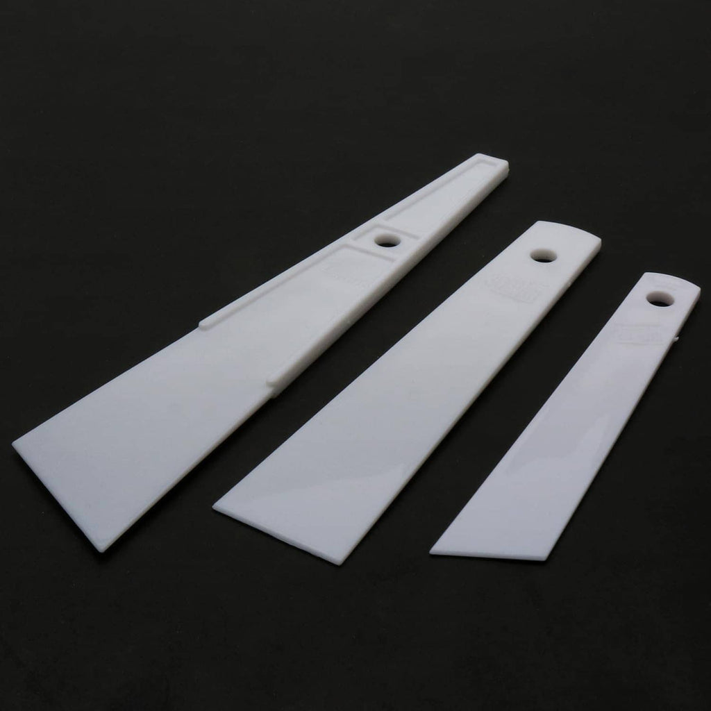 White plastic glue spreader smear sticks with hanging holes, 3-pack