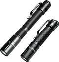 Set of two black mini LED flashlight pens with knurled grip, front lens, and side clip.