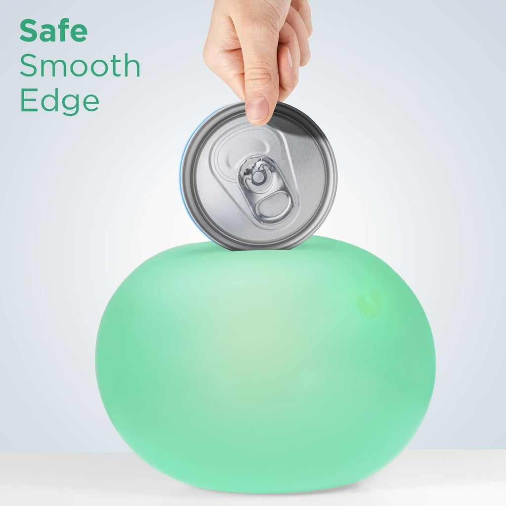 Teal rechargeable can opener with smooth edge shown lifting a metal can lid.