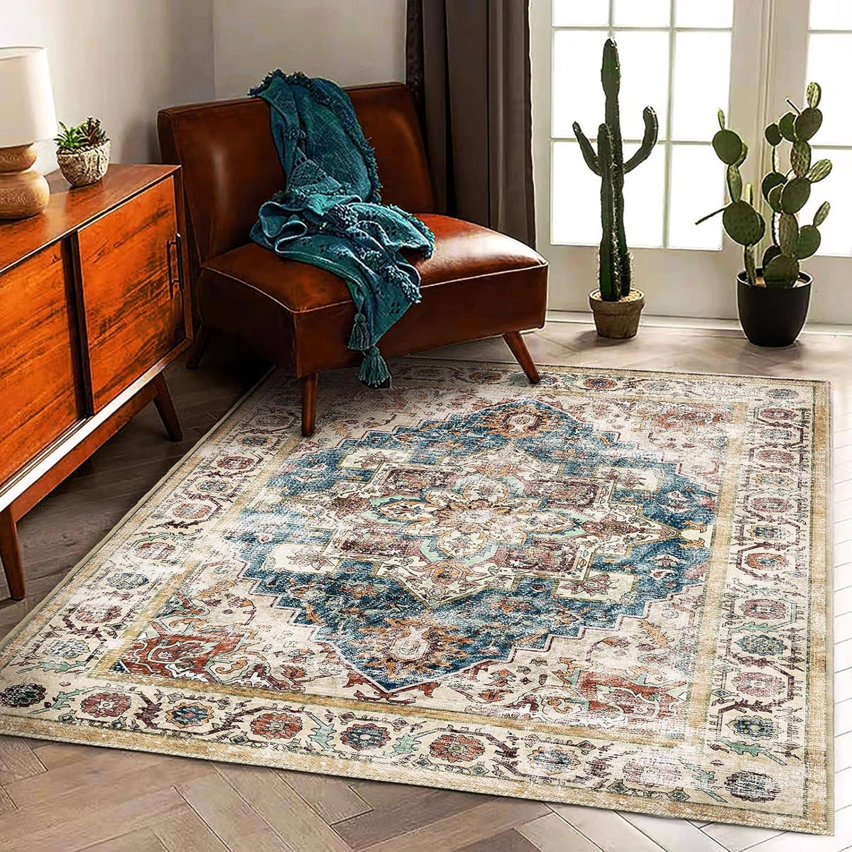 Rectangular vintage-style area rug, distressed medallions in beige with blue and rust motifs