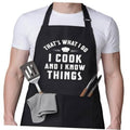 Black cooking apron with front pocket and “I cook and I know things” text graphic