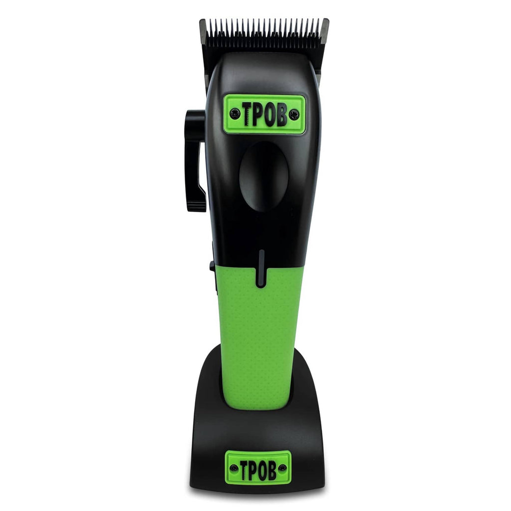 Men's hair clipper with black body and green textured grip, front blade upward