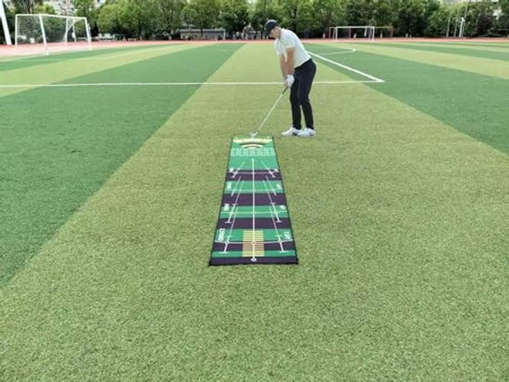 Green putting practice mat runner with grid layout and bullseye graphic at end