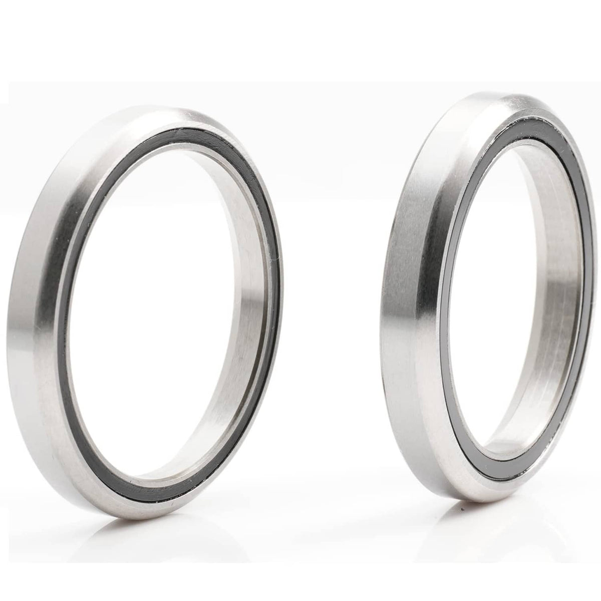 Bike headset bearing rings, angled metal rings with black inner track
