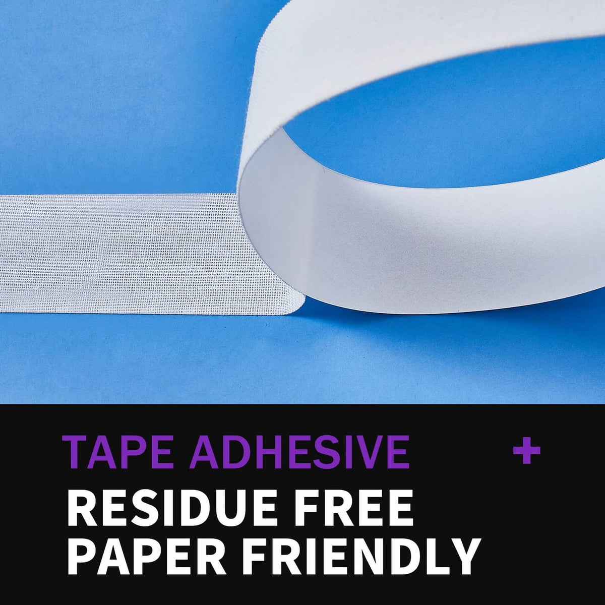 White tape strip and rolled tape close-up with smooth paper backing
