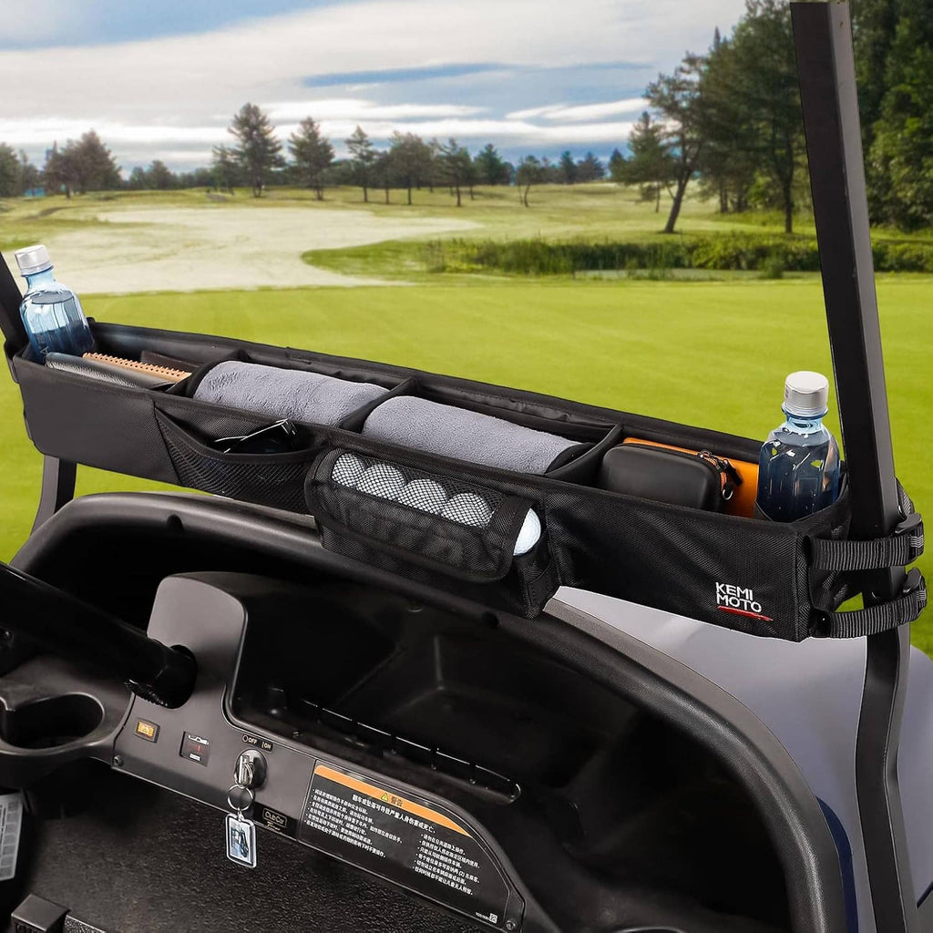 Black golf cart front storage basket holding bottles and gear in long segmented bins