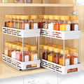 White pull-out spice rack organizer with two pullout tiers and multiple spice jars