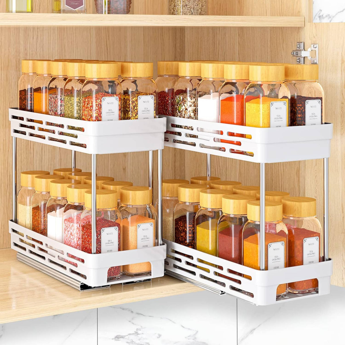White pull-out spice rack organizer with two pullout tiers and multiple spice jars