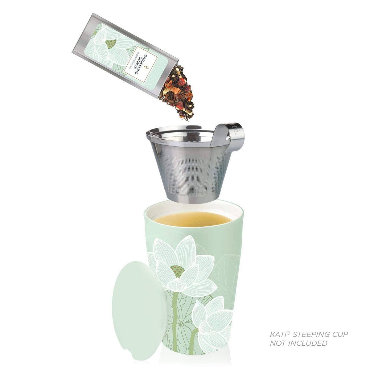 Loose leaf tea steeping into a cup using a mesh infuser and a sampler packet