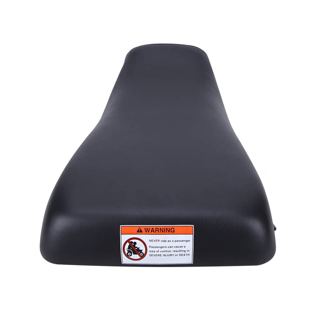 Black ATV seat with warning label on front