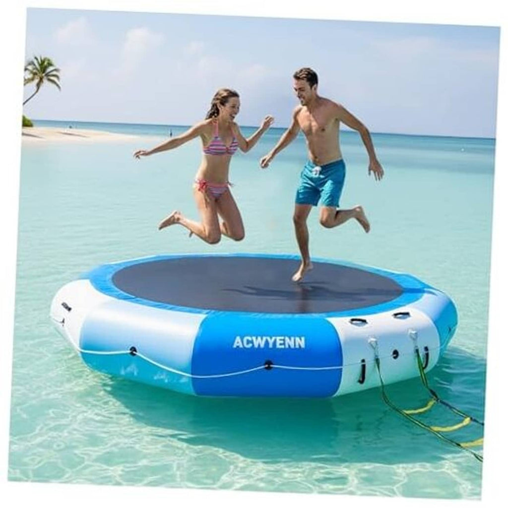 Blue and white inflatable floating water trampoline with a black round jumping mat.
