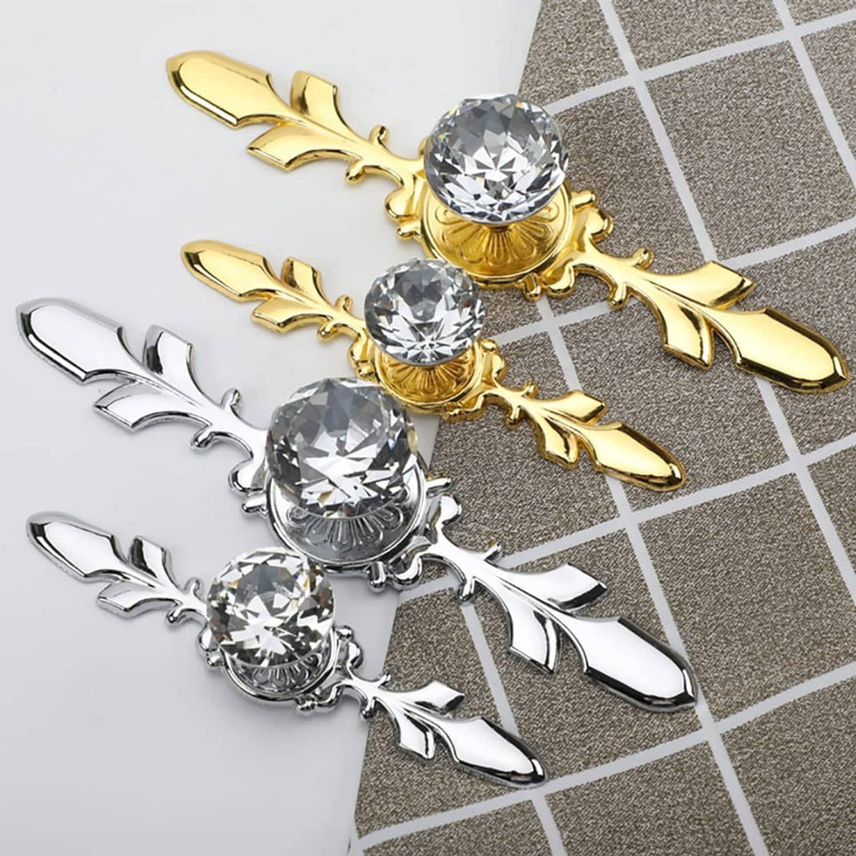 Gold and silver decorative crystal glass drawer knobs with clear faceted stones and leaf arms