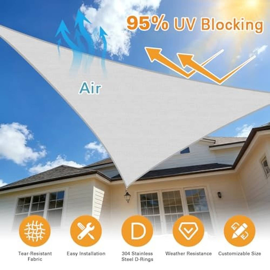 Grey triangular sun shade sail with smooth canopy stretched to house roofline