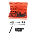 Chain breaker and rivet tool kit in red plastic case with metal punches and clamps