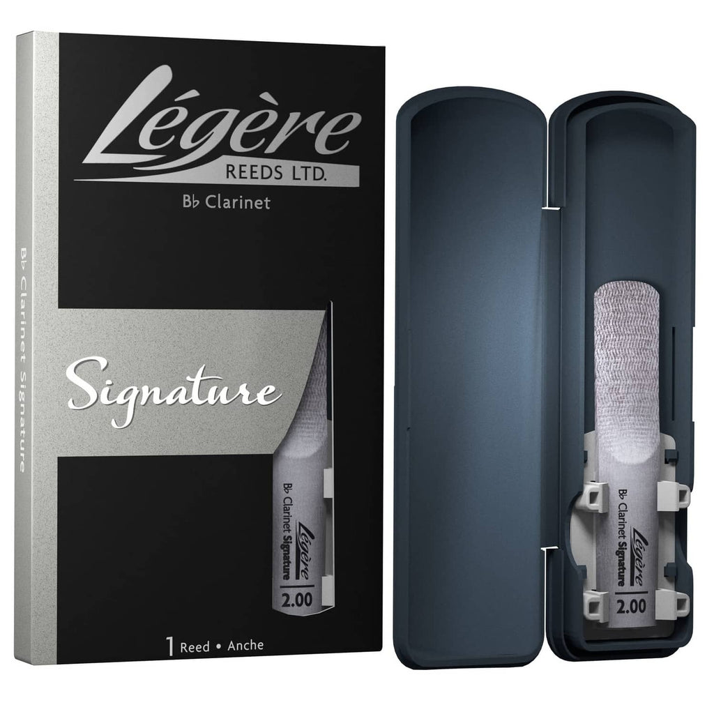 Synthetic clarinet reeds with dark carry case, clear reed visible in tray