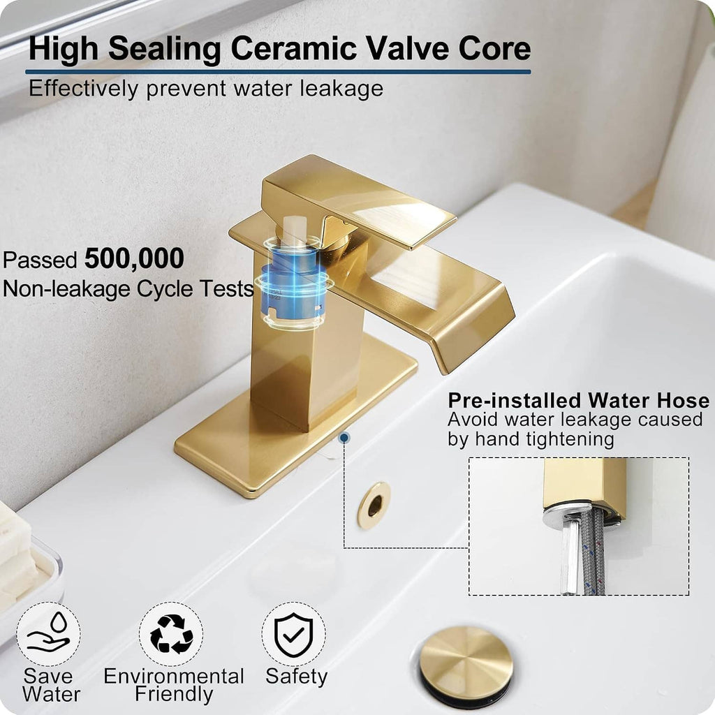 Gold single-handle bathroom faucet with waterfall spout and rectangular deck body