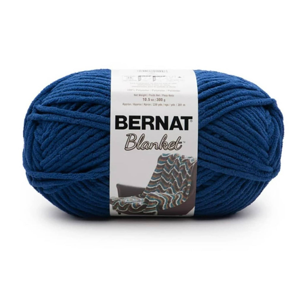 Bernat Blanket Super Bulky chenille yarn skein in deep blue with label band