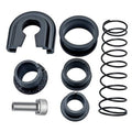 Gearbox repair kit parts: black lever bushing, rubber rings, coiled spring, threaded pin