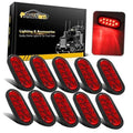 Oval LED trailer tail light set with red lenses and black housings
