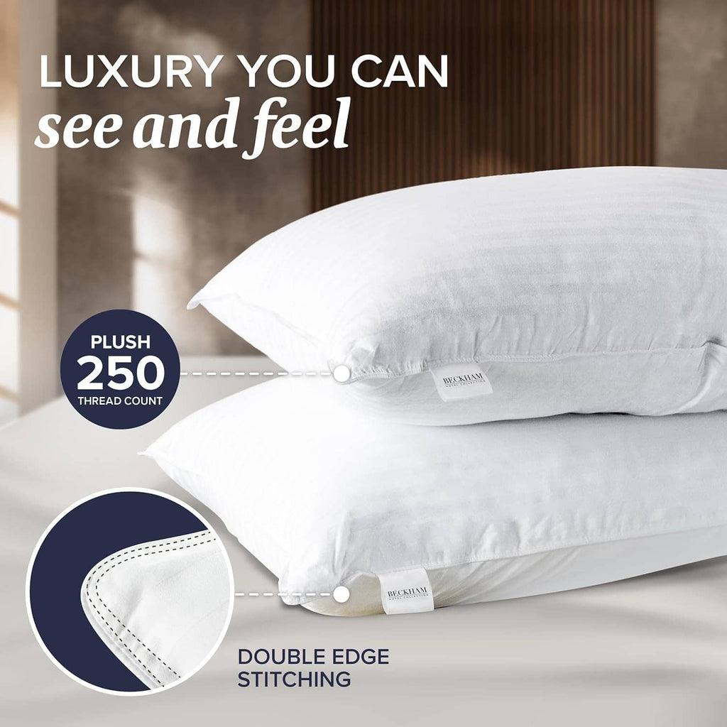 White plush down alternative pillows with double edge stitching, stacked set of two