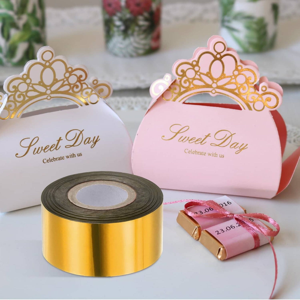 Gold hot stamping foil roll with ribbon and cutout gift tags