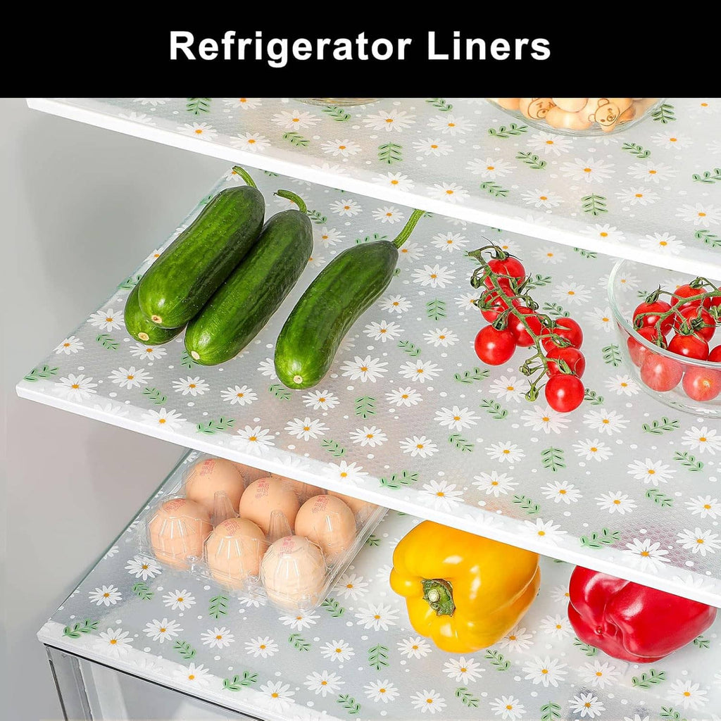 Refrigerator liner sheet with white daisy print, covers shelves for easy use
