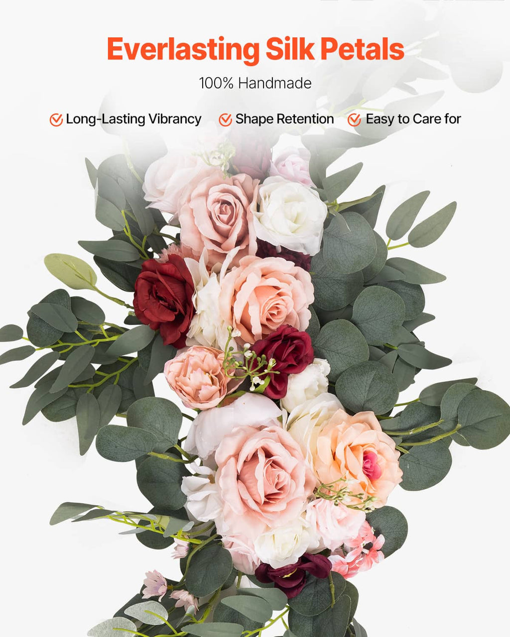 Artificial flower bouquet with pink and cream roses and lush green eucalyptus-style leaves