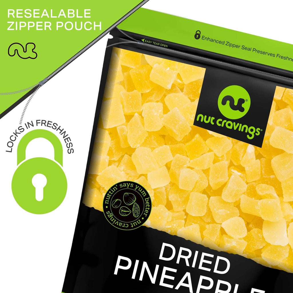 Resealable pouch of dried pineapple chunks with sugar added, close-up of contents