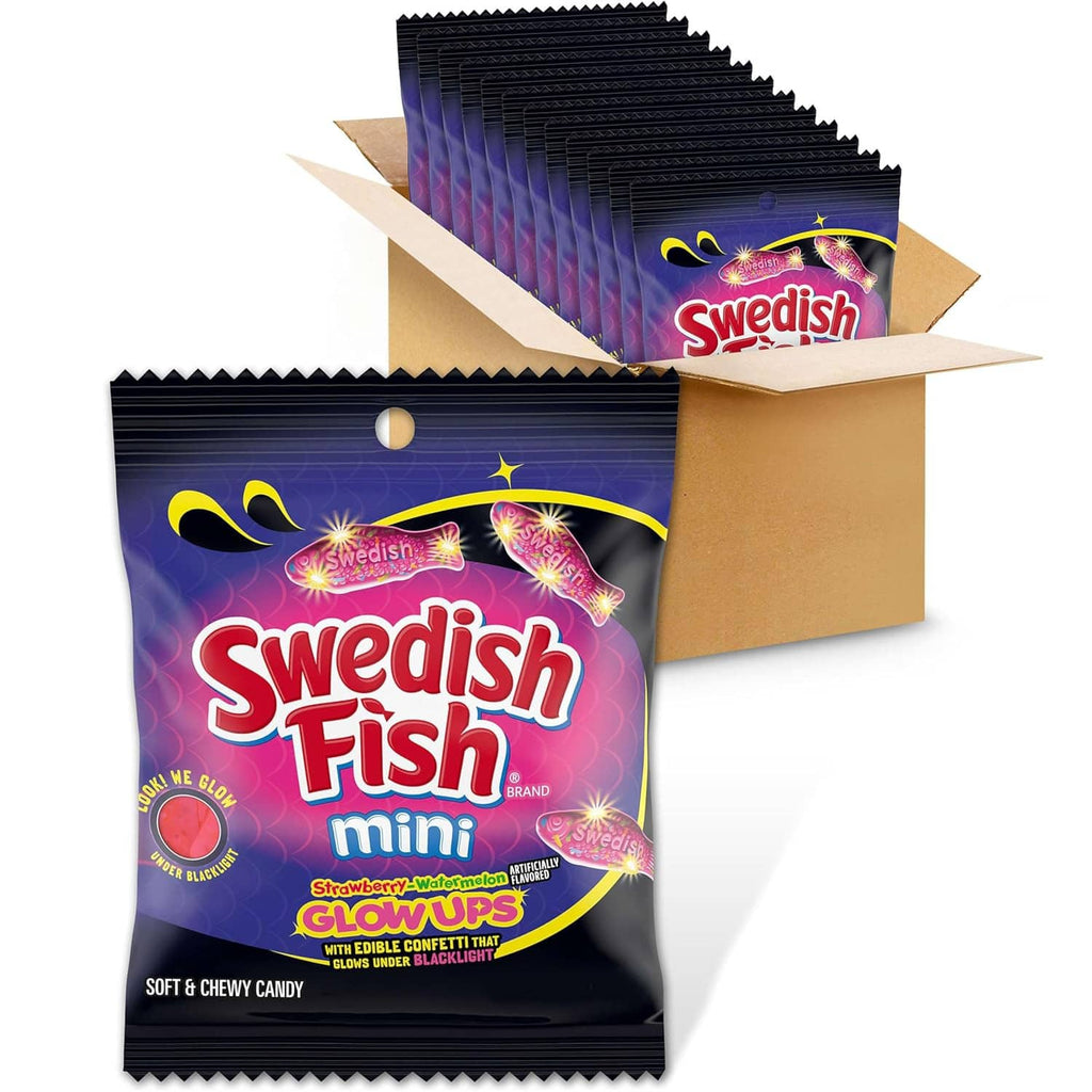 Swedish Fish mini glowups gummy candy multipack, purple pouches in open cardboard box