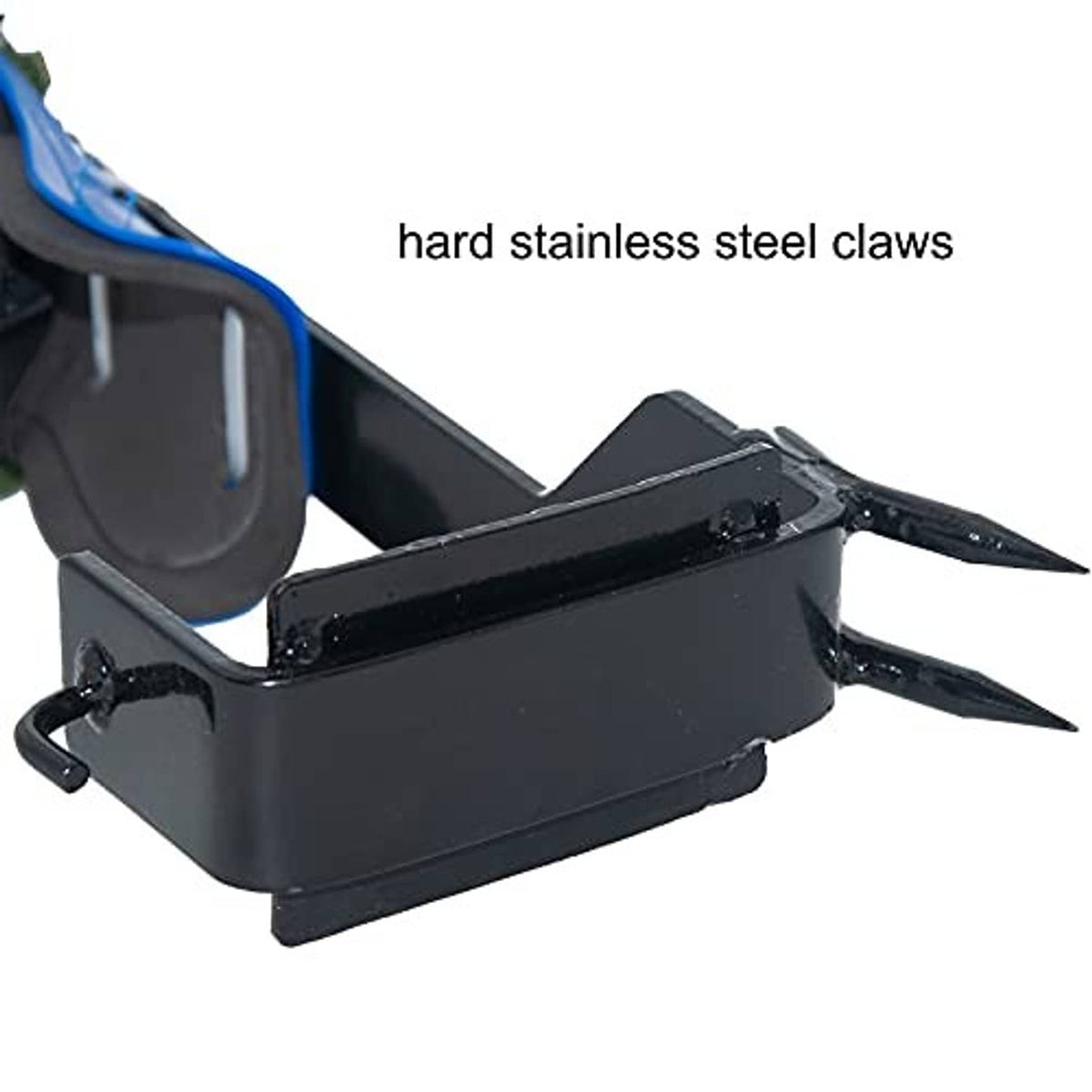 Stainless steel climbing claws on black foot plate with spike tips