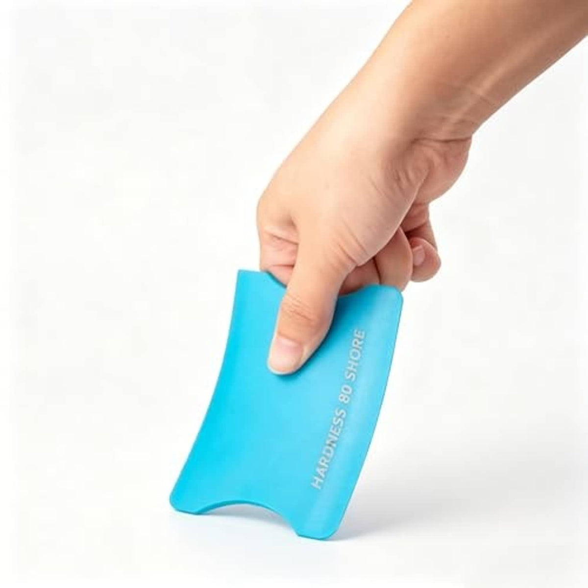 Tiffany blue vinyl squeegee in hand, curved scraper edge for vinyl