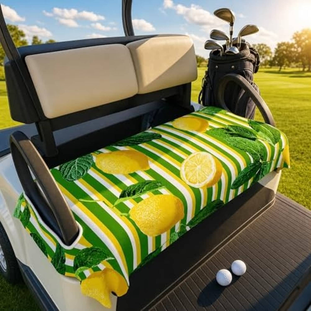 Two-seat golf cart bench seat cover in green, white, and yellow lemon stripe pattern