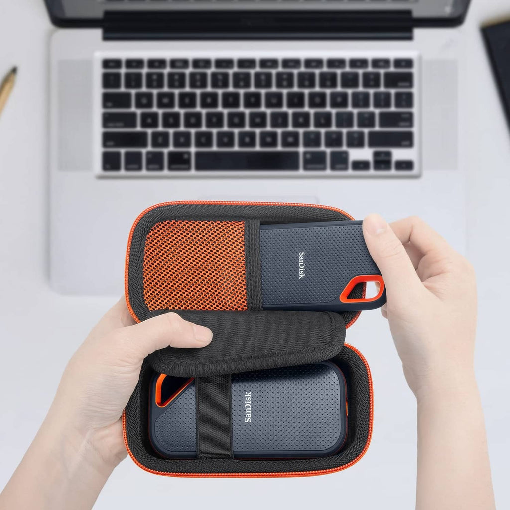 Black and orange hard SSD case with carabiner clip and pocketed divider