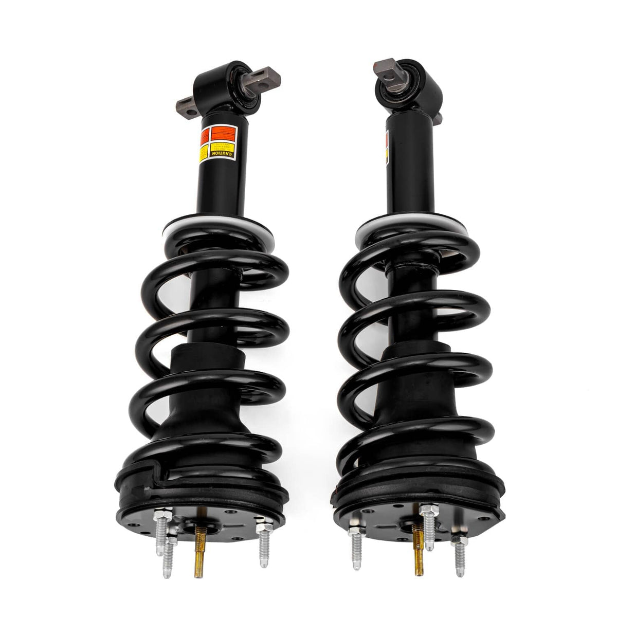 Front shock strut pair with black coils and orange label decals