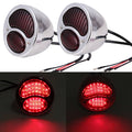 Pair of chrome oval LED tail lights with red lenses and black wire harness, for street rod