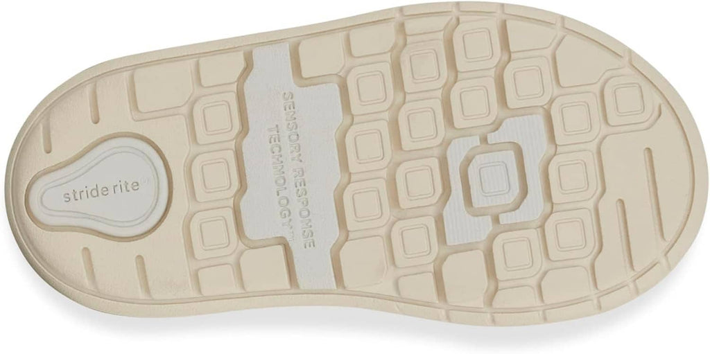 Kids sneaker rubber outsole with traction tread and Stride Rite logo