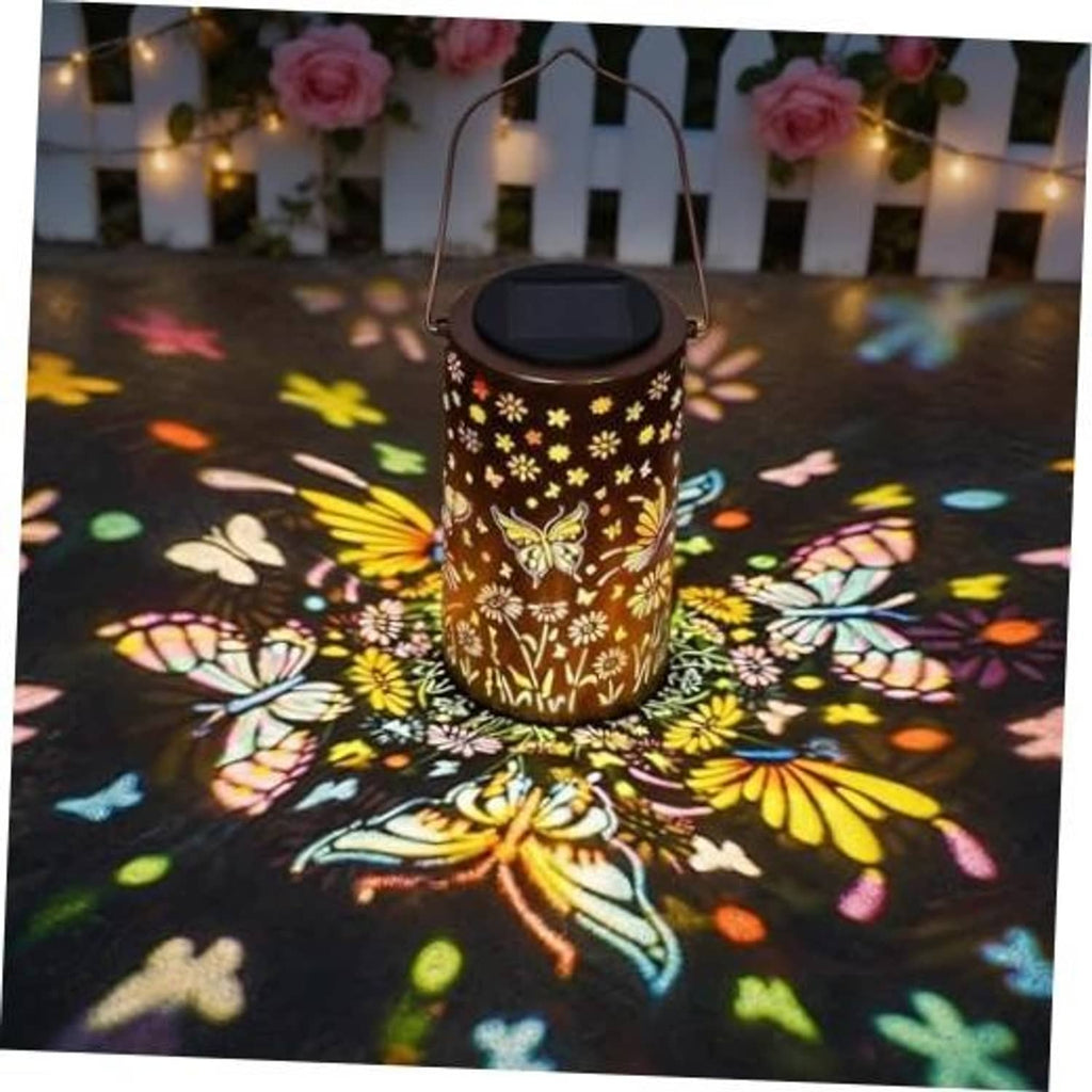 Hanging solar lantern with butterfly floral cutout pattern and black top