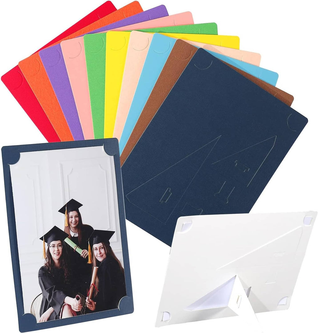 Assorted colorful cardboard picture frames with easel stands, navy and dark blue fronts