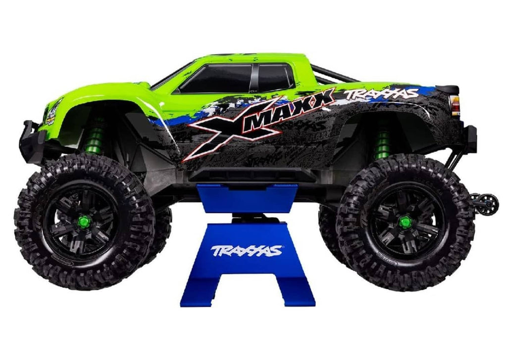 TRAXXAS X-Truck stand holding a blue/black Maxx model car