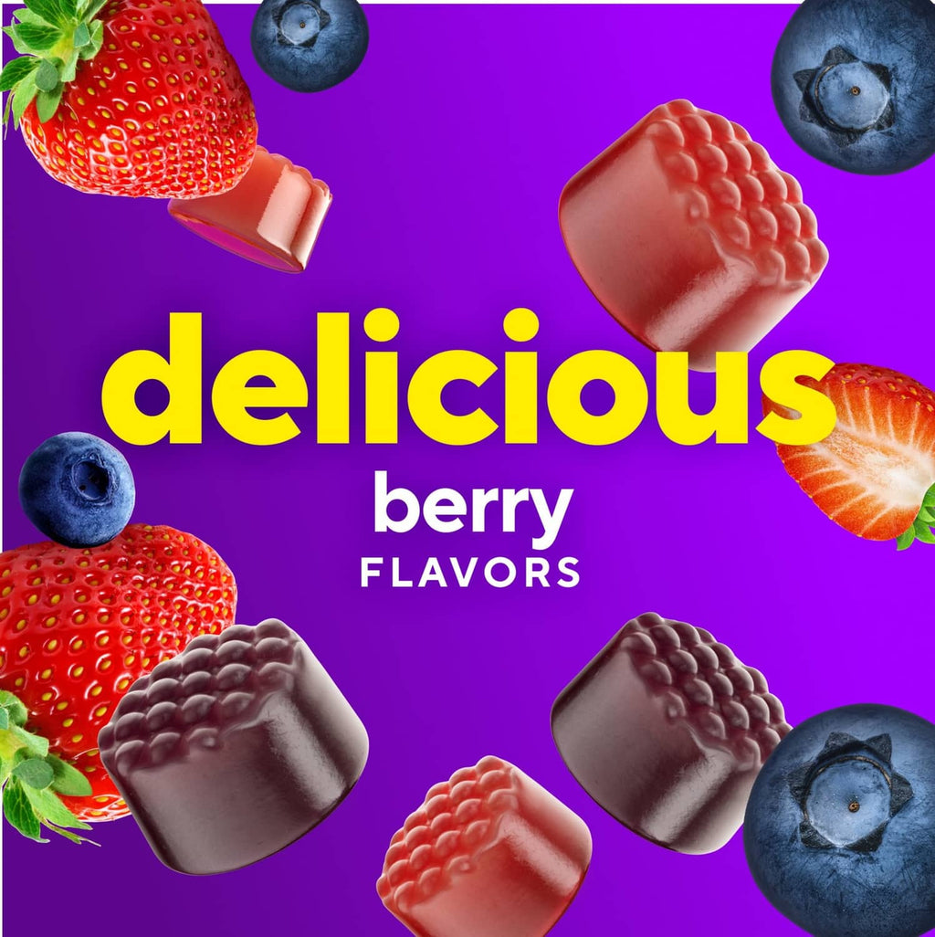 Berry-flavored multivitamin gummy pieces with strawberry and blueberry shapes