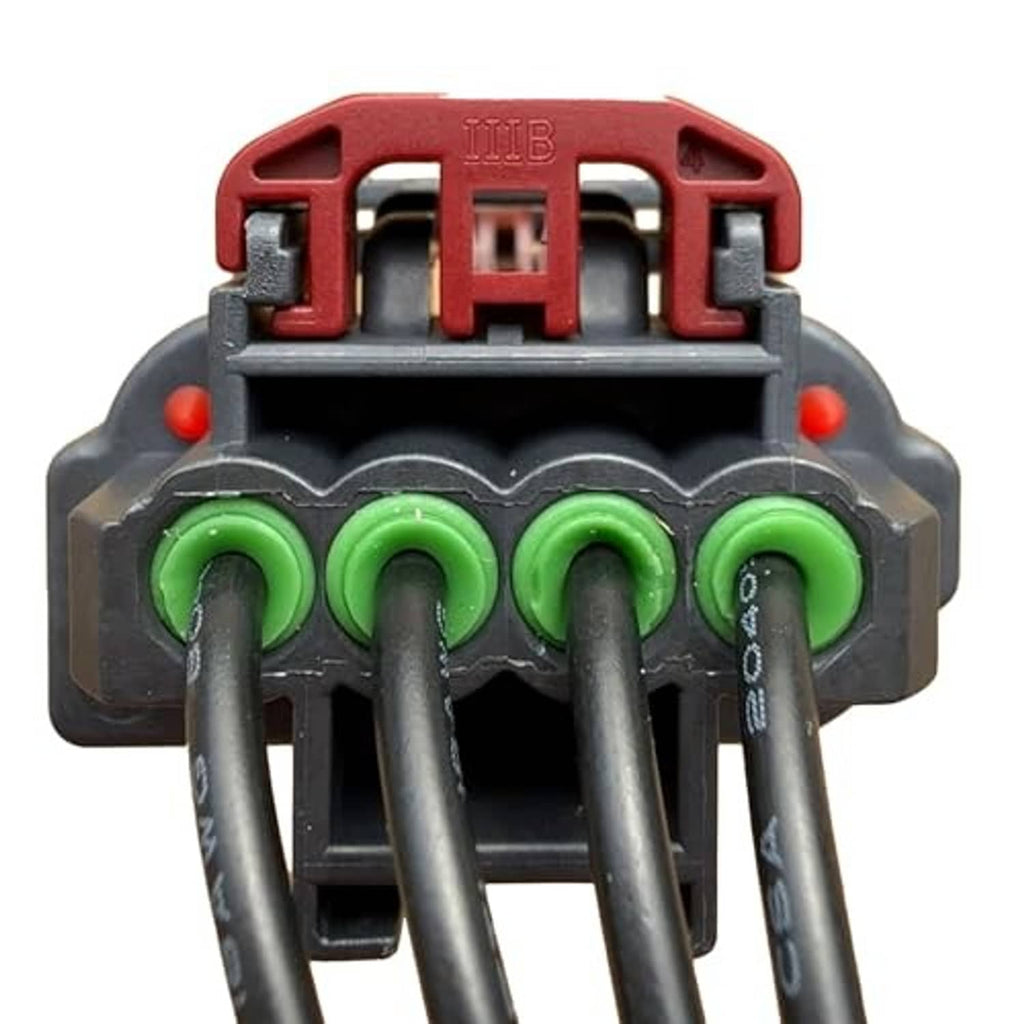 Throttle body sensor connector showing green terminal pins in red and black housing