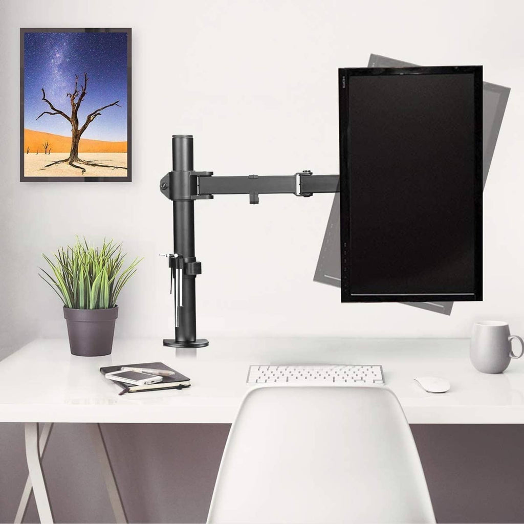 Single monitor arm desk mount with VESA plate holding a flat-screen monitor