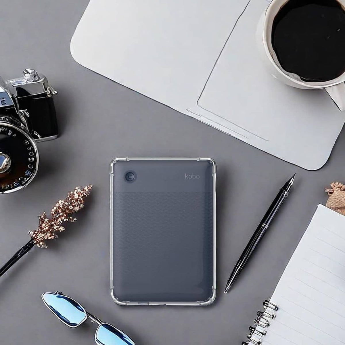 Clear TPU Kobo e-reader case over a dark back panel, viewed from above